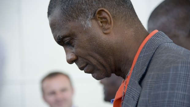 Michael Holding wants Australia's cricketers to take a knee.
