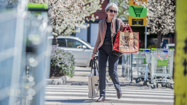 Avid reusable bag user Judy McMillan, seen shopping at the Fyshwick markets, has never found it hard to refuse the offer of plastic bags at the checkout
