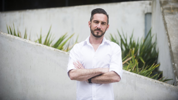 Assistant professor at University of Canberra Eamon Merrick says he and colleagues are burning out, forced to work long nights and weekends to meet unsustainable workloads.