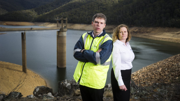 Icon Water senior analytics engineer Tim Purves and corporate affairs manager Bronwen Butterfield at Corin Dam which is currently at a third of its capacity.