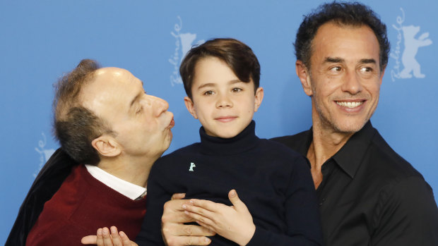 Matteo Garrone (right) with his Pinocchio stars Roberto Benigni (left) and Federico Ielapi.