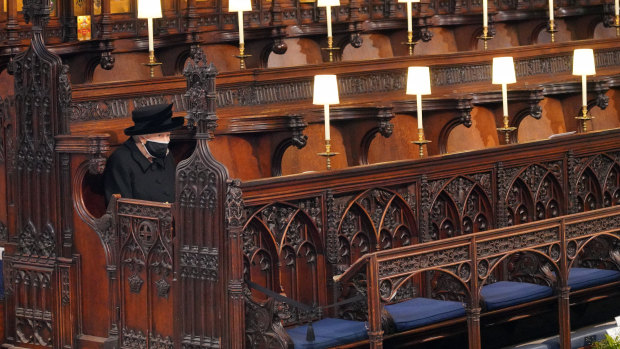 The Queen takes her seat ahead of the funeral service for Prince Philip. 