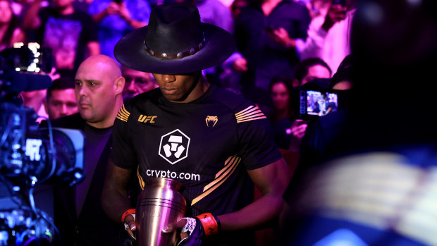 Israel Adesanya with a nod to The Undertaker.