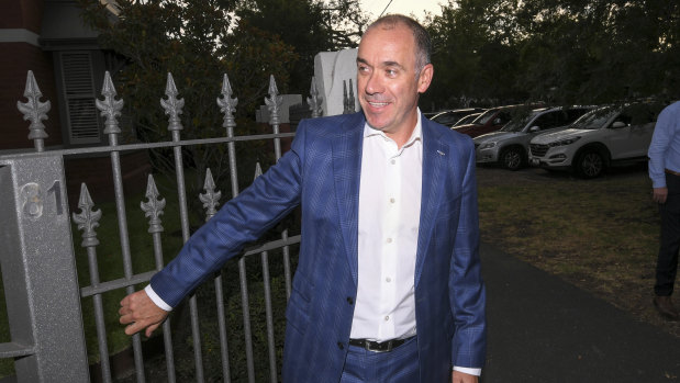 Outgoing National Australia Bank CEO Andrew Thorburn speaks to the media outside his home on Thursday. 