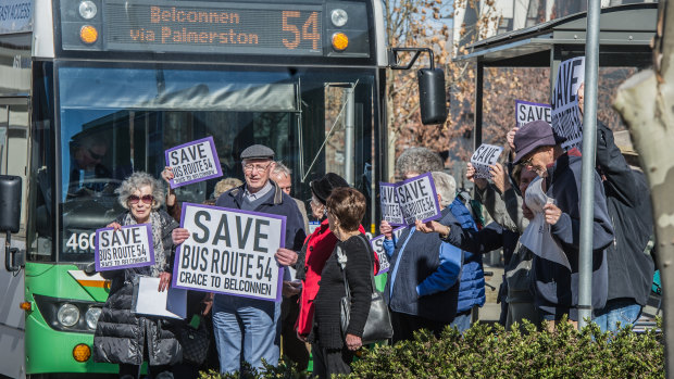 Residents of Goodwin Retirement Village and supportive neighbours in Crace hold a silent demonstration to protest the government’s proposed changes to their bus route. They briefly stepped out in front of the 11.22am bus.