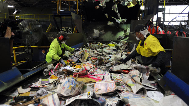 Workers at the Visy recycling plant in Brisbane.