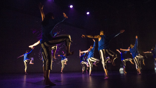 Members of the ensemble performing Empower at the Canberra Playhouse Theatre. 