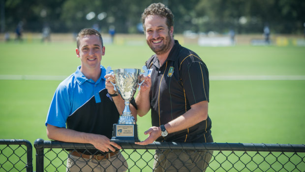 Queanbeyan captain Mark Solway  (left) and Weston Creek Molonglo pinch hitter Ben DeCarvalho with the John Gallop Cup on Friday. 