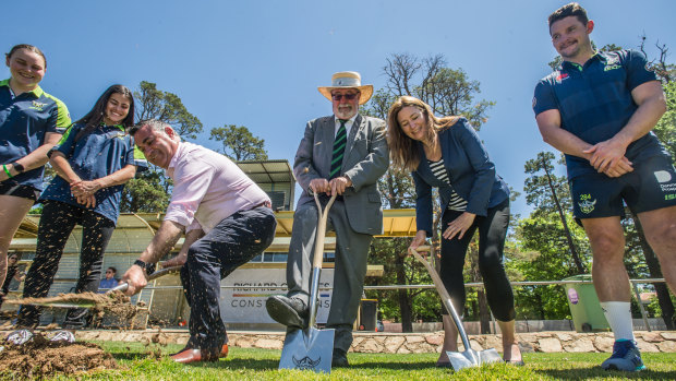 Centre from left with shovels: NSW deputy Premier John Barilaro, Raiders board member Allan Hawke and ACT deputy Chief Minister Yvette Berry turn the first sod at Northbournoe Oval, Braddon to signal the start of the construction of the new Canberra District Rugby League Centre of Excellence and Community Hub. 