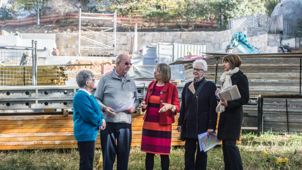 Residents of Jacka Crescent, Campbell, take Caroline Le Couteur, centre,  to see recent developments in the street. Residents from left are Caroll Perron, Mike Nash, Julie Doyle and Luisa Capezio.