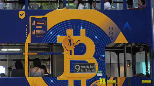 A global phenomenon. An advertisement for Bitcoin on a tram in Hong Kong. 