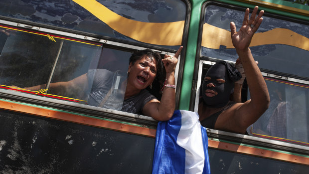 Students who had taken refuge at the Jesus of Divine Mercy church amid a barrage of armed attacks, arrive on a bus to the Metropolitan cathedral, in Managua, on Saturday.