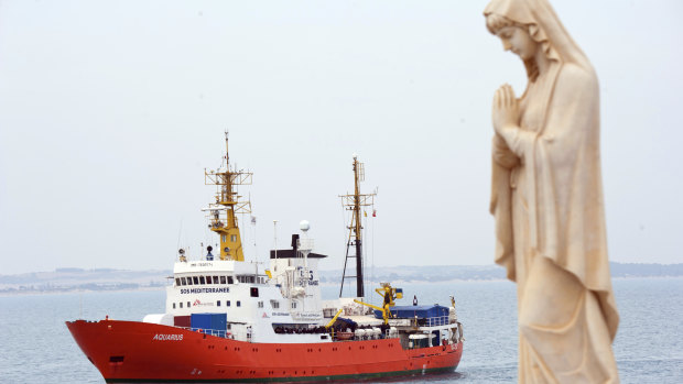 The rescue vessel Aquarius approaches the Pozzallo harbour, southern Italy.