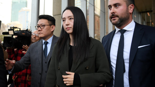 Xuan Dong, the wife of Chinese actor Yunxiang Gao, leaves court on Friday. 