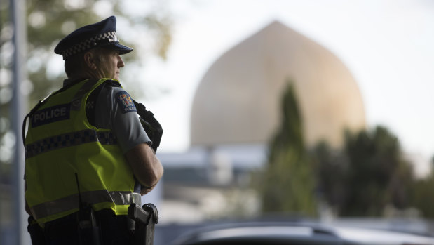 A policeman stands guard in front of the Al Noor mosque in Christchurch.