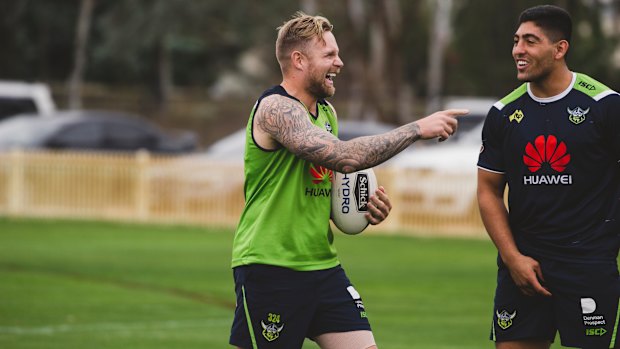 Raiders five-eighth Blake Austin sharing a laugh with Emre Guler.