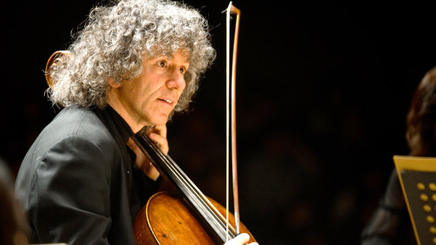 Steven Isserlis played 'Cello Concerto No. 1', 'like a man in a world tipped up on end by madness'.
