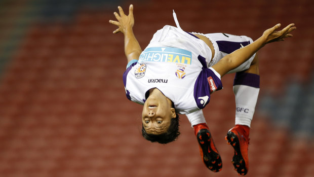 Sam Kerr does a backflip after scoring a hat-trick for Perth Glory.