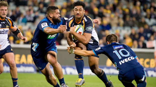 Brumbies centre Irae Simone on the charge against the Blues.