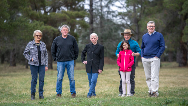 Yarralumla residents worried about planned roadworks across golden sun moth habitat to provide access to the new brickworks housing estate, from left Gwen Jamieson, David Johnstone, Dr Diana Wright, Peter and Nina Pharoah and David Harvey.