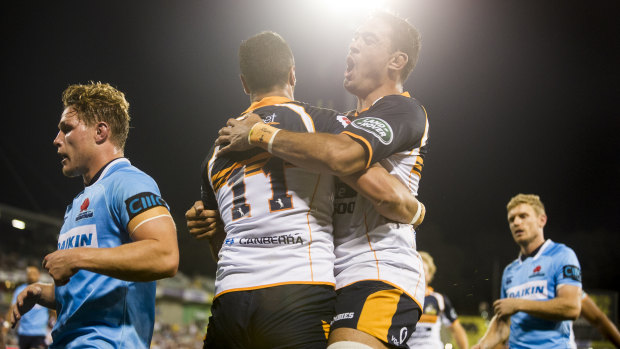 Brumbies Vs NSW Waratahs March 31 2018. Left Lock Rory Arnold celebrates with Left Wing Lausii Taliauli after he scores a try. 
