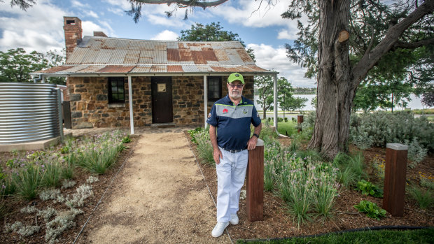 Allan Hawke, former secretary of defence and descendent of the Blundells, in front of the historic Canberra cottage.  