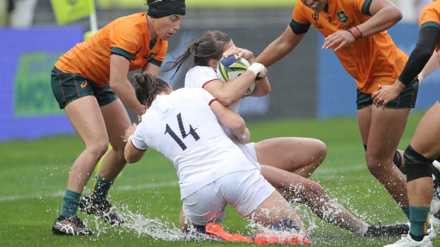 Soaking rain turned the pitch into a slip-and-slide in Waitakere on Sunday. 