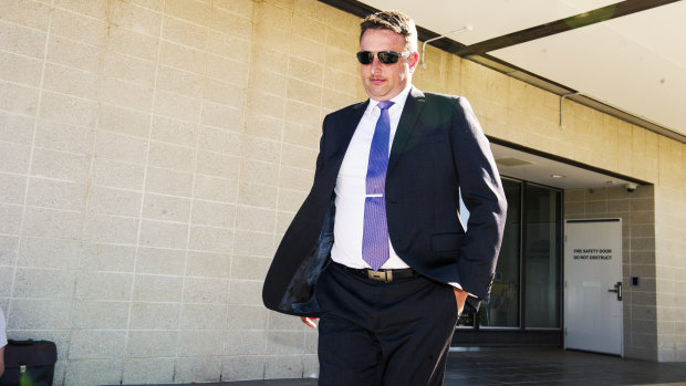 Former Australian Navy lieutenant commander Alexander Bryan Gillett walks out of the ACT Supreme Court after being sentenced.
