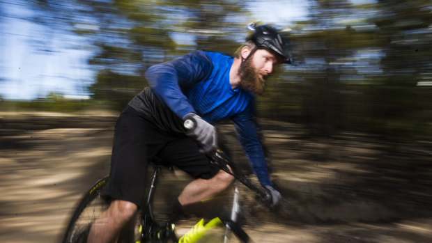 Mountain biker Josh Kentwell is calling on the ACT government to fund new and more challenging trails at Mt Stromlo.