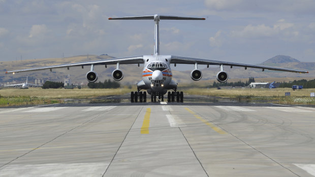 A Russian transport aircraft, carrying parts of the S-400 air defense systems, lands at Murted military airport in Ankara, Turkey.