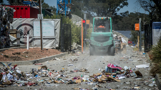 Recyclable material is compacted and removed from the facility.