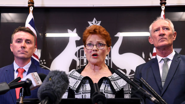 One Nation leader Pauline Hanson, flanked by party officials James Ashby (left) and Steve Dickson.