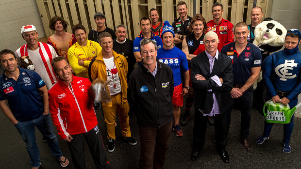 The 18 AFL coaches with Neale Daniher.