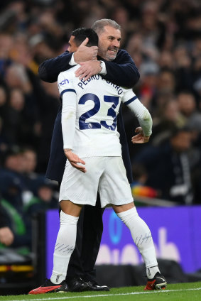 Ange Postecoglou embraces Pedro Porro after Spurs’ third goal.