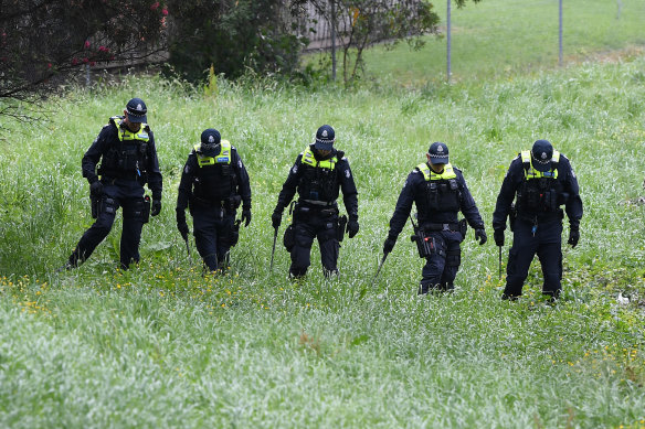 Police conduct a line search at Dandenong Creek in Bayswater after Mr Virgona was found dead in a van on  EastLink.