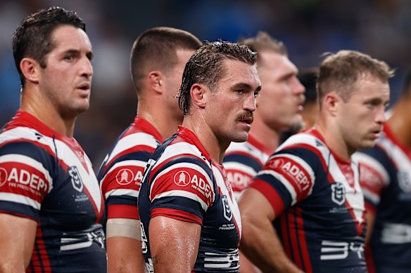 The Roosters look on during their 40-4 defeat by the Panthers.