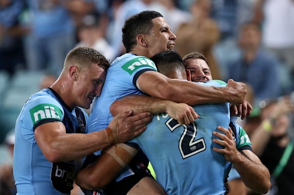 Daniel Tupou and the Blues celebrate.