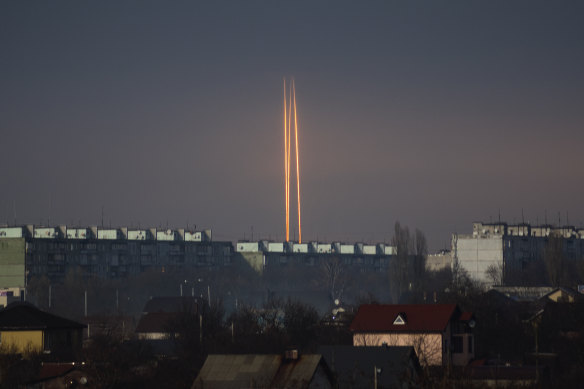 Three Russian rockets launched against Ukraine from Russia’s Belgorod region are seen at dawn in Kharkiv, Ukraine, on March 9.