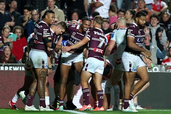 Happy Sea Eagles after Jason Saab’s try.