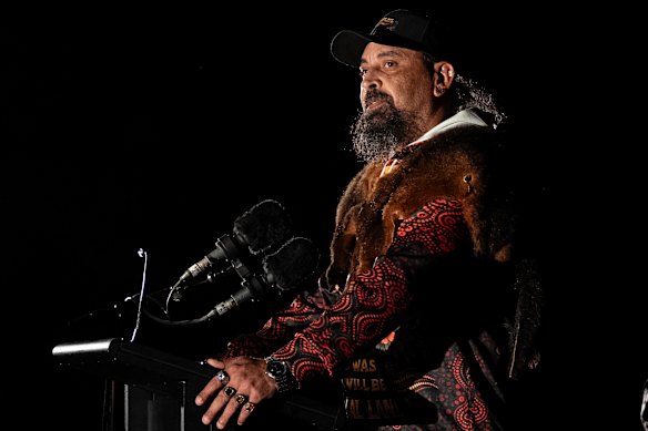 Uncle Mark Brown conducts the welcome to country during the dawn service at the Shrine of Remembrance on Anzac Day.