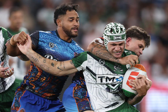 Kalyn Ponga takes a hit-up for the Maori All Stars on Saturday night