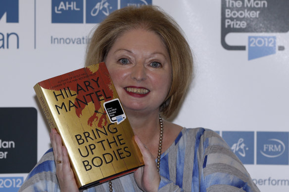 Hilary Mantel, winner of the Man Booker Prize for Fiction, poses with a copy of her book Bring up the Bodies.