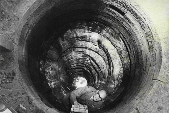 John Cowen of the Royal Australian Engineers in a final inspection after completion of the restoration of Busby’s Bore on October 14, 1975. 