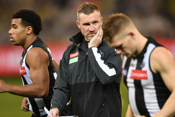 Magpies coach Nathan Buckley (centre) is seen during the Round 19 match between Collingwood and Richmond.