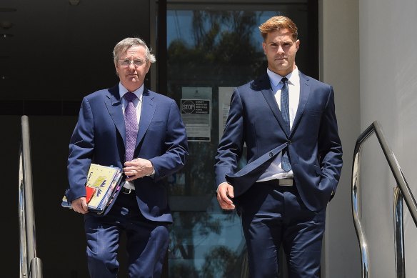 Jack de Belin (right) leaves court next to his barrister David Campbell SC.