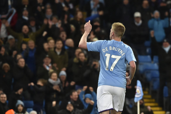 Kevin de Bruyne celebrates with the crowd after scoring City's second goal.