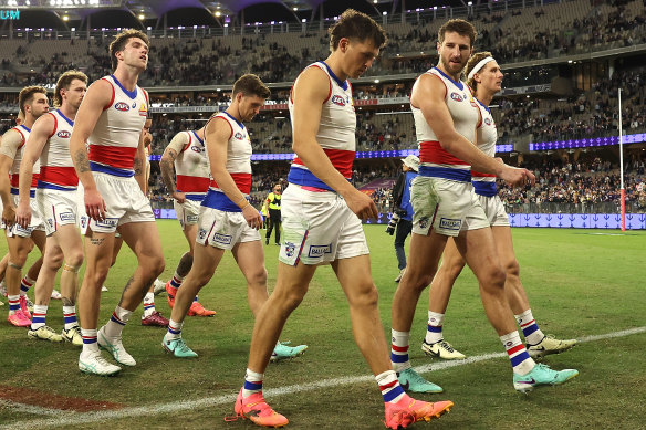 Missing in action: Marcus Bontempelli (second from right) was stuck on the pine in the last term.