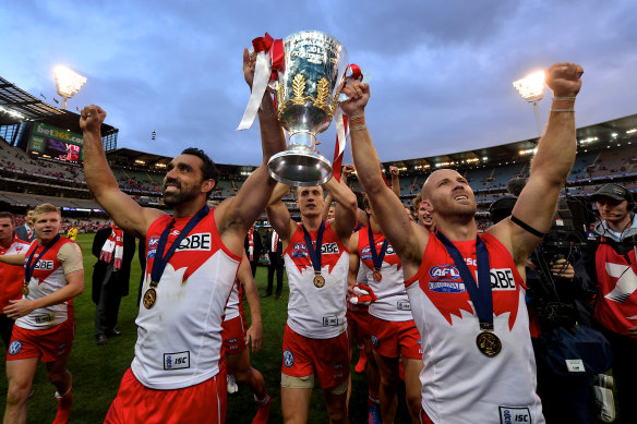 Adam Goodes and Jarrad McVeigh celebrate the Swans’ 2012 premiership victory.