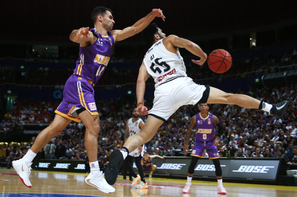 Kings captain Kevin Lisch and Shea Ili of Melbourne United.