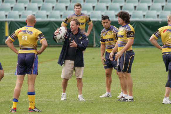 Brian Smith leading a training session with Eels players, including Nathan Hindmarsh (right), in 2006.